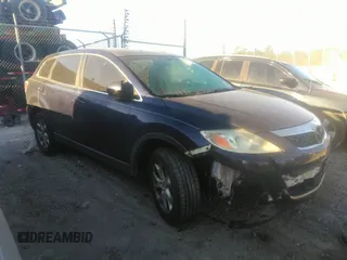 2011 Mazda CX-9 Touring z VIN JM3TB2CA7B0330879, wystawiony jako IAAI lot #40628534 z przebiegiem 159 256 mil mil oraz . Historia ofert i sprzedaży dostępna na DreamBid. Obrazek 1.