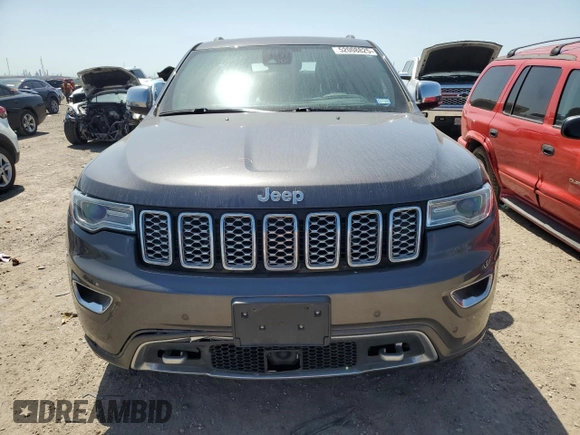 2017 Jeep Grand Cherokee Overland with VIN 1C4RJFCGXHC941983, listed as a Copart auction lot 52008825 with 65,776 mi miles and Salvage Title. Bid and sale history available at carsss.com. Image 5.