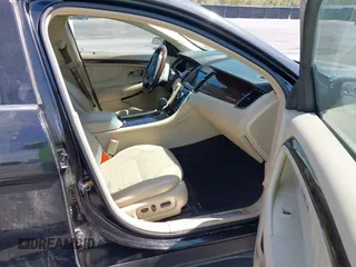 2015 Ford Taurus Limited with VIN 1FAHP2J81FG134973, listed as a IAAI auction lot 41845384 with 139,203 mi miles. Bid and sale history available at carsss.com. Image 5.