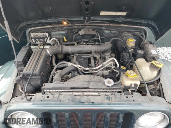 2002 Jeep Wrangler Sahara with VIN 1J4FA59S52P763290, listed as a Copart auction lot 59115665 with 129,479 mi miles and Non repairable. Bid and sale history available at DreamBid. Image 11.