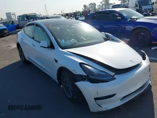 2022 Tesla Model 3 with VIN 5YJ3E1EA4NF319237, listed as a IAAI auction lot 41263761 with 44,384 mi miles and . Bid and sale history available at DreamBid. Image 1.