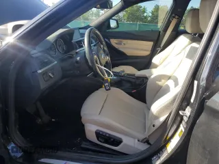 2015 BMW 3 Series 328i xDrive with VIN WBA3B3C59FJ985091, listed as a Copart auction lot 57658705 with 106,521 mi miles and Salvage title. Bid and sale history available at DreamBid. Image 7.