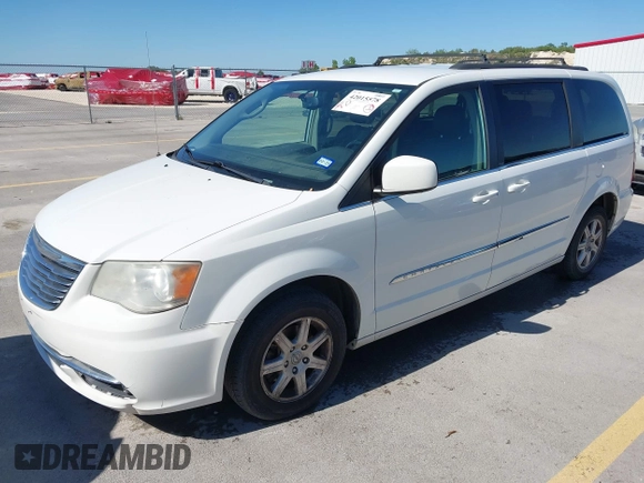 2012 Chrysler Town & Country Touring with VIN 2C4RC1BG7CR308985, listed as a IAAI auction lot 42015578 with 196,604 mi miles. Bid and sale history available at carsss.com. Image 2.
