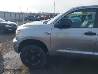 2010 Toyota Tundra 4WD Truck with VIN 5TFDW5F11AX142704, listed as a IAAI auction lot 41230112 with 201,697 mi miles. Bid and sale history available at carsss.com. Image 6.