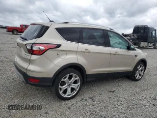 2017 Ford Escape Titanium with VIN 1FMCU0J98HUD75004, listed as a Copart auction lot 51627805 with 74,166 mi miles and Salvage Title. Bid and sale history available at carsss.com. Image 3.