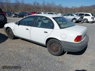 1999 Saturn SL with VIN 1G8ZH5282XZ178928, listed as a IAAI auction lot 41758412 with 249,418 mi miles. Bid and sale history available at carsss.com. Image 3.