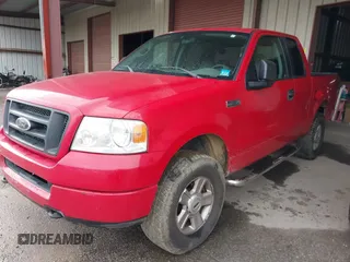 2005 Ford F-150 STX with VIN 1FTRX14W95FA16354, listed as a IAAI auction lot 41947407 with 227,458 mi miles. Bid and sale history available at carsss.com. Image 2.