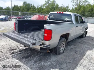 2014 Chevrolet Silverado 1500 LT with VIN 1GCRCREC7EZ321610, listed as a IAAI auction lot 41754959 with 203,264 mi miles. Bid and sale history available at carsss.com. Image 4.