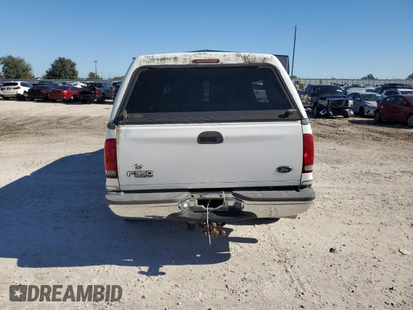 1999 Ford F-350 XL with VIN 1FTSW30F3XEE22631, listed as a Copart auction lot 83521754 with 368,980 mi miles and Salvage title. Bid and sale history available at DreamBid. Image 6.