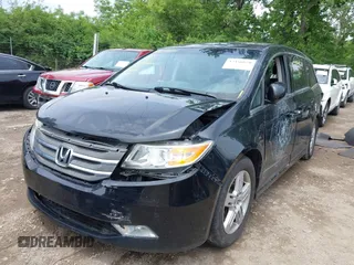 2012 Honda Odyssey Touring with VIN 5FNRL5H91CB121950, listed as a IAAI auction lot 42456620 with 200,831 mi miles and . Bid and sale history available at DreamBid. Image 17.