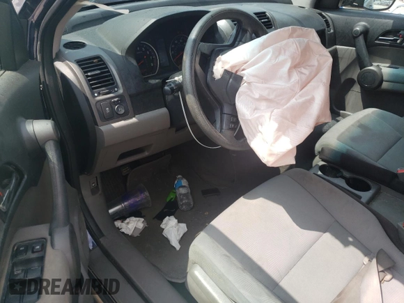 2010 Honda CR-V LX z VIN 5J6RE4H31AL084547, wystawiony jako Copart lot #57335165 z przebiegiem 184 988 mil mil oraz Szkoda całkowita • Salvage title. Historia ofert i sprzedaży dostępna na DreamBid. Obrazek 8.