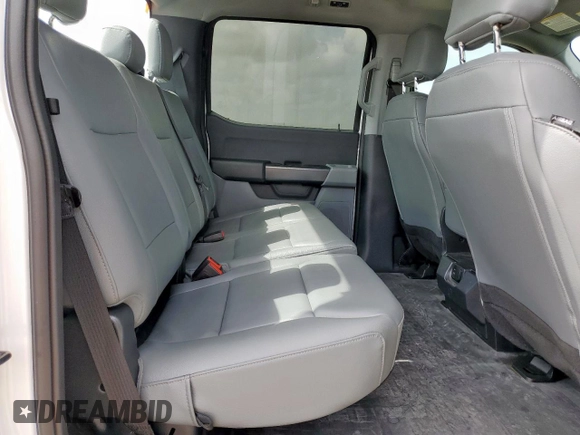 2023 Ford F-150 XL с VIN 1FTEW1CP9PKG21142, выставлен на аукционе Copart как лот 63073825 с пробегом 18 539 миль миль и Списание • Salvage title. История ставок и продаж доступна на DreamBid. Изображение 10.