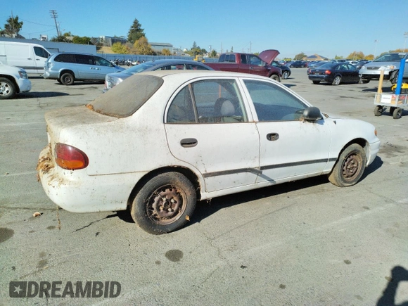 1997 Hyundai Accent z VIN KMHVF24NXVU373676, wystawiony jako Copart lot #77866484 z przebiegiem 151 949 mil mil oraz Tytuł czysty. Historia ofert i sprzedaży dostępna na DreamBid. Obrazek 3.