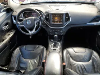 2014 Jeep Cherokee Trailhawk with VIN 1C4PJMBS7EW157305, listed as a Copart auction lot 49436685 with 138,446 mi miles and Salvage Title. Bid and sale history available at carsss.com. Image 8.