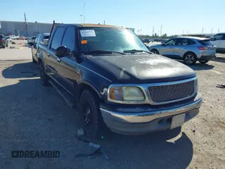 2003 Ford F-150 XLT with VIN 1FTRW07L43KB05221, listed as a IAAI auction lot 41762332 with 226,660 mi miles. Bid and sale history available at carsss.com. Image 1.