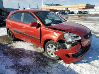 2009 Kia Rio LX with VIN KNADE243596567394, listed as a Copart auction lot 42240065 with 160,044 mi miles and Salvage Title. Bid and sale history available at carsss.com. Image 4.