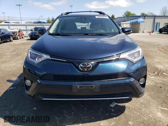 2018 Toyota RAV4 XLE with VIN JTMRFREV5JJ747135, listed as a Copart auction lot 50868015 with 63,403 mi miles and Salvage Title. Bid and sale history available at carsss.com. Image 5.