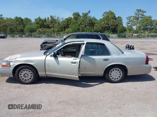 2004 Mercury Grand Marquis GS with VIN 2MEFM74W14X632470, listed as a IAAI auction lot 42120233 with 292,357 mi miles and . Bid and sale history available at DreamBid. Image 14.
