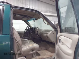 1996 Chevrolet Tahoe z VIN 1GNEK13R4TJ417000, wystawiony jako IAAI lot #41992121 z przebiegiem 166 215 mil mil oraz . Historia ofert i sprzedaży dostępna na DreamBid. Obrazek 5.