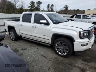 2018 GMC Sierra 1500 Denali z VIN 3GTU2PEJ1JG531226, wystawiony jako Copart lot #49286105 z przebiegiem 130 923 mil mil oraz Szkoda całkowita • Salvage title. Historia ofert i sprzedaży dostępna na DreamBid. Obrazek 4.