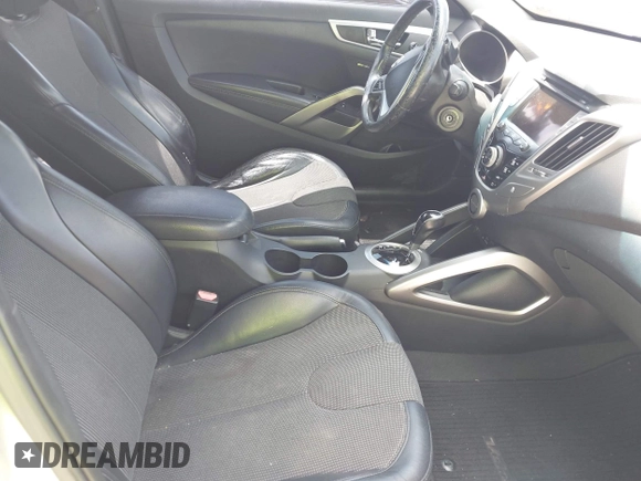 2012 Hyundai Veloster w/Gray Int with VIN KMHTC6ADXCU028115, listed as a IAAI auction lot 42361550 with 118,920 mi miles and . Bid and sale history available at DreamBid. Image 5.