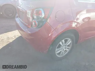 2014 Chevrolet Sonic LT with VIN 1G1JC6SH6E4215294, listed as a IAAI auction lot 41282441 with 107,583 mi miles. Bid and sale history available at carsss.com. Image 13.