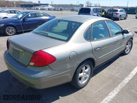 2002 Ford Taurus SE Standard with VIN 1FAFP53U02A215964, listed as a IAAI auction lot 42063534 with 187,424 mi miles and . Bid and sale history available at DreamBid. Image 4.