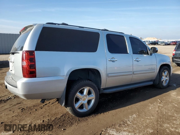 2013 Chevrolet Suburban LS with VIN 1GNSKHE7XDR139052, listed as a Copart auction lot 84878314 with 219,943 mi miles and Clean Title. Bid and sale history available at carsss.com. Image 3.