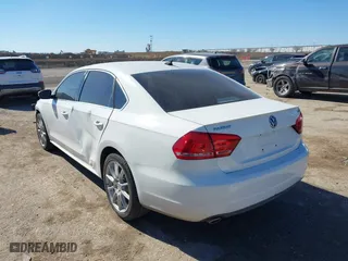 2014 Volkswagen Passat TDI SE w/Sunroof with VIN 1VWBN7A32EC016554, listed as a IAAI auction lot 41472156 with 178,149 mi miles. Bid and sale history available at carsss.com. Image 3.