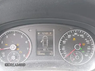 2012 Volkswagen Passat SE z VIN 1VWBM7A33CC076083, wystawiony jako IAAI lot #42260077 z przebiegiem 186 066 mil mil oraz . Historia ofert i sprzedaży dostępna na DreamBid. Obrazek 7.