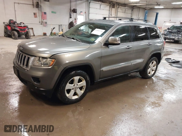 2011 Jeep Grand Cherokee Laredo with VIN 1J4RR4GG7BC578079, listed as a IAAI auction lot 42491750 with 197,581 mi miles and . Bid and sale history available at DreamBid. Image 18.