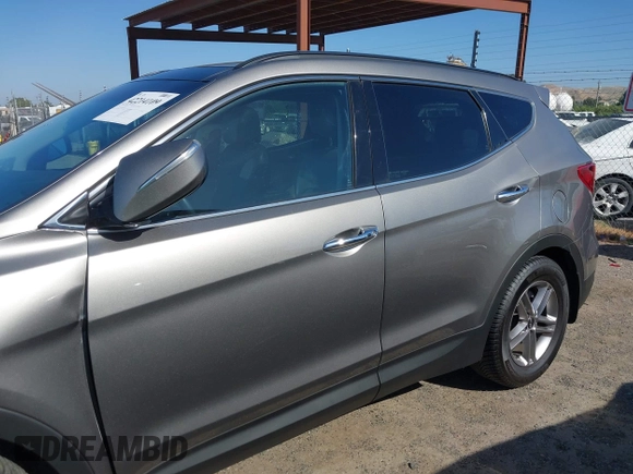 2017 Hyundai Santa Fe 2.4L z VIN 5XYZU3LB4HG446961, wystawiony jako IAAI lot #42214109 z przebiegiem 140 175 mil mil oraz . Historia ofert i sprzedaży dostępna na DreamBid. Obrazek 14.