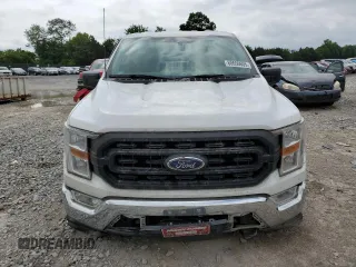 2021 Ford F-150 XL with VIN 1FTMF1EP7MKE72931, listed as a Copart auction lot 60650605 with 23,825 mi miles and Salvage title. Bid and sale history available at DreamBid. Image 5.