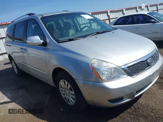 2012 Kia Sedona LX with VIN KNDMG4C70C6491703, listed as a IAAI auction lot 42128411 with 246,586 mi miles. Bid and sale history available at carsss.com. Image 1.