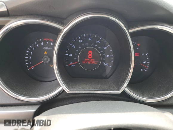 2012 Kia Optima LX z VIN KNAGM4A74C5296344, wystawiony jako Copart lot #58660875 z przebiegiem 151 386 mil mil oraz Szkoda całkowita • Salvage title. Historia ofert i sprzedaży dostępna na DreamBid. Obrazek 9.