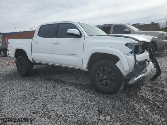2023 Toyota Tacoma 4WD SR with VIN 3TMCZ5AN2PM593958, listed as a Copart auction lot 84627294 with 18,928 mi miles and Salvage Title. Bid and sale history available at carsss.com. Image 4.