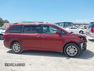 2016 Toyota Sienna XLE with VIN 5TDYK3DC7GS716470, listed as a IAAI auction lot 42177176 with 121,165 mi miles and . Bid and sale history available at DreamBid. Image 14.