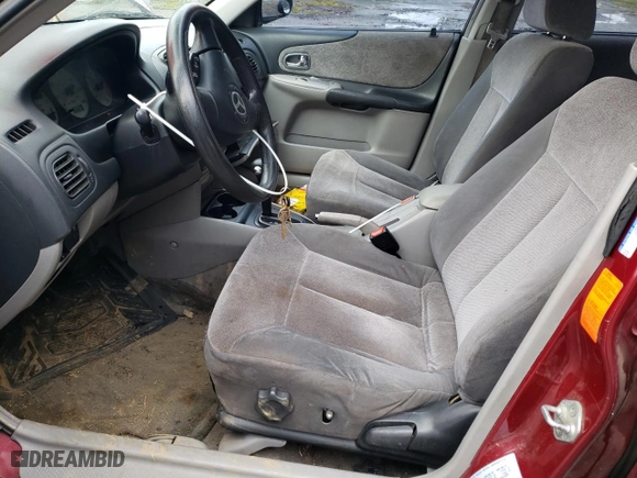 2003 Mazda Protege DX with VIN JM1BJ226231137913, listed as a Copart auction lot 44426935 with 237,221 mi miles and Salvage Title. Bid and sale history available at carsss.com. Image 7.