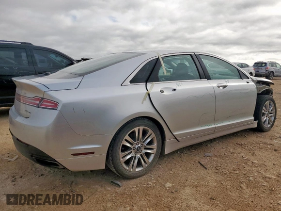 2014 Lincoln MKZ z VIN 3LN6L2G90ER815819, wystawiony jako Copart lot #61189515 z przebiegiem 101 148 mil mil oraz Szkoda całkowita • Salvage title. Historia ofert i sprzedaży dostępna na DreamBid. Obrazek 3.