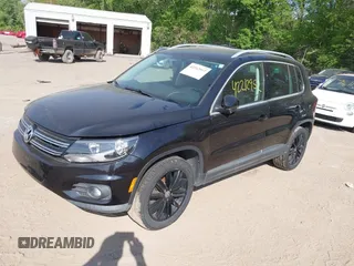 2012 Volkswagen Tiguan SEL with VIN WVGAV7AX5CW544968, listed as a IAAI auction lot 42212952 with 172,758 mi miles and . Bid and sale history available at DreamBid. Image 2.