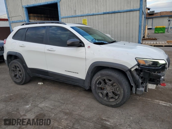 2019 Jeep Cherokee Trailhawk Elite with VIN 1C4PJMBX7KD360617, listed as a Copart auction lot 45765245 with 58,229 mi miles and Salvage Title. Bid and sale history available at carsss.com. Image 4.