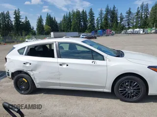 2019 Subaru Impreza with VIN 4S3GTAA63K3733496, listed as a IAAI auction lot 42500553 with 65,708 mi miles and . Bid and sale history available at DreamBid. Image 14.
