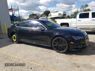 2018 Audi S7 Prestige with VIN WAU2FAFC1JN090694, listed as a Copart auction lot 72414024 with 71,184 mi miles and Salvage Title. Bid and sale history available at carsss.com. Image 4.