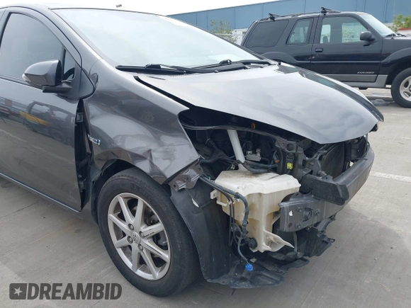 2013 Toyota Prius One with VIN JTDKDTB34D1047568, listed as a IAAI auction lot 41950373 with 99,319 mi miles and . Bid and sale history available at carsss.com. Image 6.