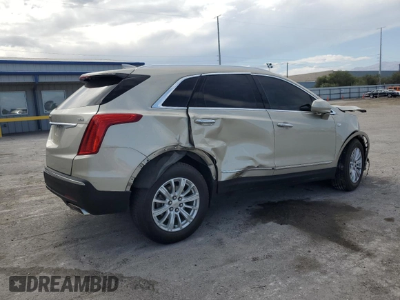 2017 Cadillac XT5 FWD with VIN 1GYKNARSXHZ158528, listed as a Copart auction lot 59761385 with 100,238 mi miles and Salvage title. Bid and sale history available at DreamBid. Image 3.