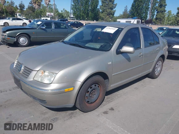 2004 Volkswagen Jetta GL z VIN 3VWRA69M64M039222, wystawiony jako IAAI lot #42262445 z przebiegiem 100 200 mil mil oraz . Historia ofert i sprzedaży dostępna na DreamBid. Obrazek 2.