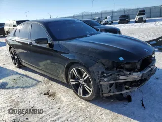 2016 BMW 7 Series 750i xDrive with VIN WBA7B0C50GG526899, listed as a Copart auction lot 46712485 with 97,985 mi miles and Salvage title. Bid and sale history available at DreamBid. Image 4.