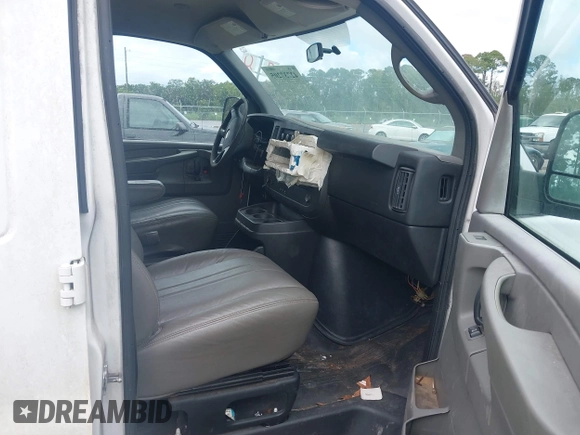 2014 Chevrolet Express Cargo with VIN 1GCSGAFX0E1110921, listed as a IAAI auction lot 42737205 with 177,631 mi miles and . Bid and sale history available at DreamBid. Image 5.