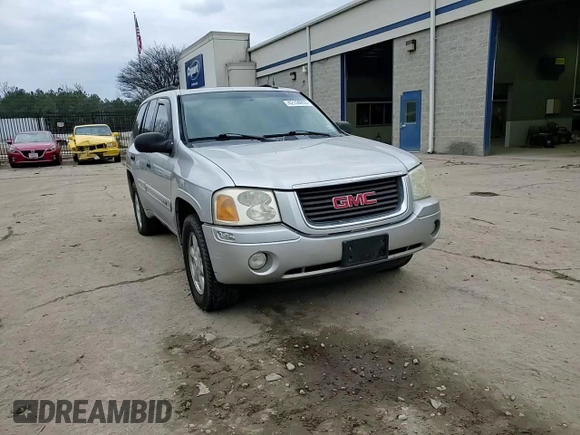 2005 GMC Envoy SLT with VIN 1GKDT13S652197929, listed as a Copart auction lot 42104855 with 228,515 mi miles and Salvage Title. Bid and sale history available at carsss.com. Image 12.