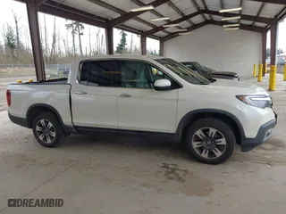 2017 Honda Ridgeline RTL-E with VIN 5FPYK3F7XHB030551, listed as a IAAI auction lot 41903844 with 153,594 mi miles. Bid and sale history available at carsss.com. Image 13.